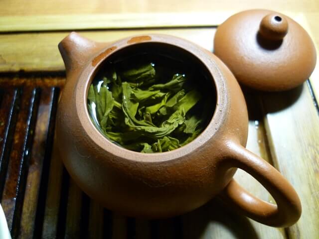 A teapot full of green tea